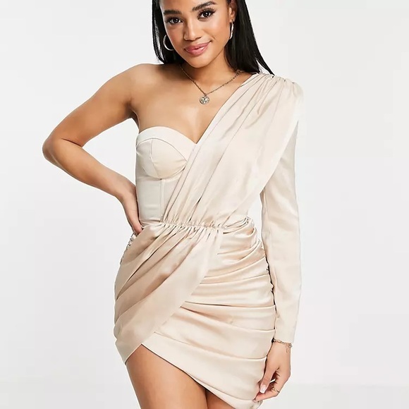 lavish alice champagne dress our girl @alanaguymer wears the Asymmetric Draped Mini Dress in Champagne. https://lavishalice.com/products/asymmetric-draped-mini- dress-in-champagne
